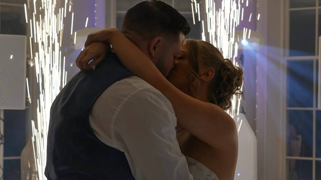 A first kiss as the sparklers fire